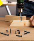 Premium Black Wood Screws Assortment Kit 250 Piece Heavy Duty Carbon Steel Fasteners for deck repair and furniture building in use.
