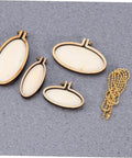 Five Piece Mini Wood Embroidery Hoops Set With Screws For Cross Stitch And DIY Needlework displayed on fabric surface
