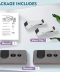 Package items including manual, two visor clips, and two remotes for Two Pack Universal Garage Door Remote For 2006 To 2013 Openers With Purple Learn Button Only Security Plus 315 MHz Works With Most 315 MHz Openers From Major Brands Two Remotes Included.
