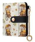 Totally Clutch Vintage Rickshaw Bifold Wallet For Women Featuring Autumn Leaves Motif with antique design and black strap.