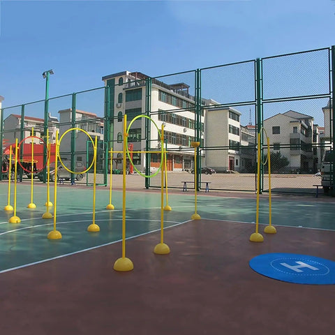 Outdoor setup of Drone Racing Obstacle Course Kit For Home And Outdoors, Easy To Build And Beginner Friendly on basketball court