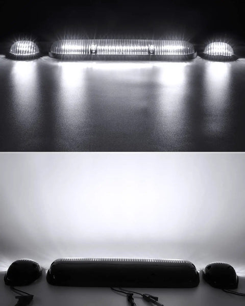 Three Piece Smoke Lens 30 LED Cab Marker Lights Kit With Wire Pack For Silverado Sierra Trucks illuminated on a dark surface