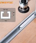 Close-up of Beefy Quick Screw Down Guide Rail Clamps showing 5-3/8 inch opening and 2-3/8 inch throat depth on a worktable.