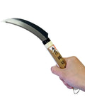 Person holding All Steel Rope Cutting Scythe For Tough As Nails Rigging And Outdoor Use, Durable Forged Steel Blade with wooden handle.
