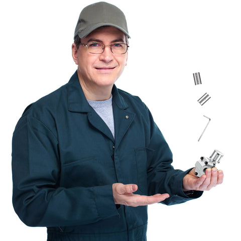 Front view of Swakuta BPV-31 compatible 10-pack valve kit with metal fittings and hex key, held by a man in blue coveralls.