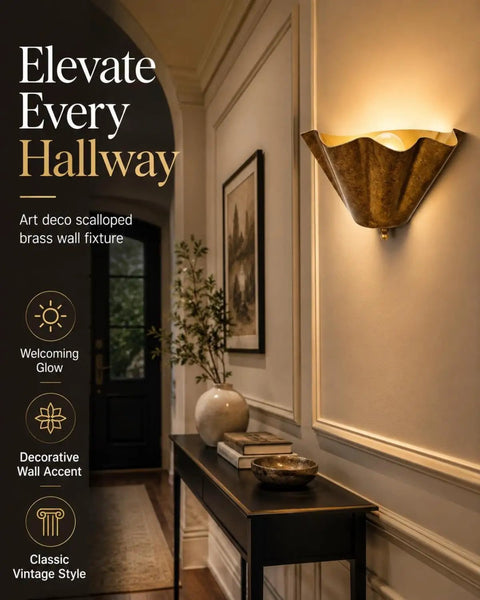 QUOLM Vintage Bronze Wall Sconce, Scalloped Uplight Wall Lamp, E26 on a wall, featuring a fan-shaped vintage bronze shade.