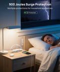 Flat Plug Power Strip With 8 In 1 USB Ports And Wall Mount 4 AC Outlets 2 USB C 2 USB A 5 Foot Extension Cord on bedside table