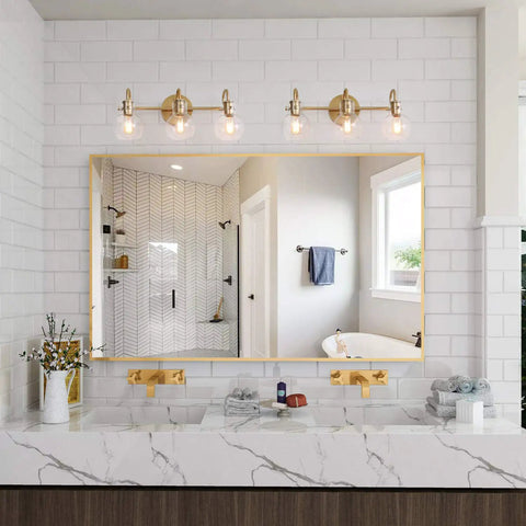 Gold 3 Light Vanity Light Fixture Over Mirror With Globe Clear Glass Shades for bathroom, offering sleek chic minimalist lighting.
