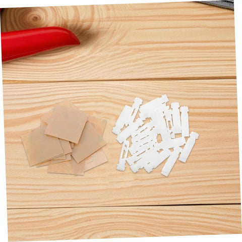 Vertical Blind Slats And Stems Replacement Kit For Damaged Blinds Easy DIY Fix For Windows With Durable Parts Quick Restoration And A Fresh Look Includes Plenty Of Slats Stems And Hardware For Fast No Fuss Replacement, set of white slats and stems on wooden surface