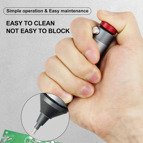 Hand holding SS-02 Desoldering Solder Sucker Pro-Grade Desoldering Tool, compact design, close-up of silicone nozzle.