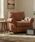 MD 20 Mini Deluxe Guitar Amp Bundle With Power Supply placed beside brown armchair and table in cozy living room.