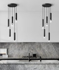 Cool Modern Dimmable LED Pendant Light Fixture In Black, 5 Light Mini Pendant Set over a kitchen island with marble backsplash