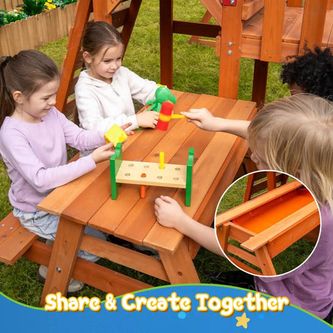 Children playing at 2-in-1 outdoor table, part of Cedar Wooden Swing Set For Backyard With Monkey Bars, 6-Foot Wave Slide, and Climbing Wall