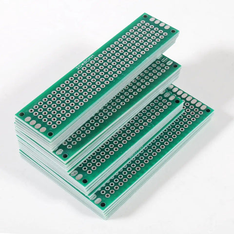 Stacked green FR4 boards from 20 Piece Double Sided PCB Prototype Kit For DIY Projects Four Sizes Includes Five Boards Per Size
