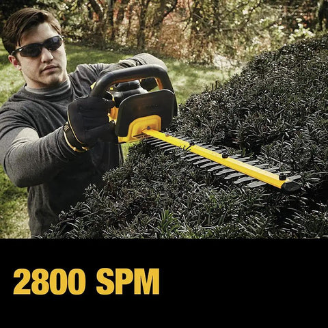 Powerful 20V Max Cordless Hedge Trimmer With 22 Inch Laser Cut Blade, Tool Only in use trimming a bush