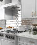 Mirror Peel And Stick Subway Tile Beveled Glass Backsplash For Kitchen And Bathroom Wall 3x6 Inch Self Adhesive installed in white kitchen