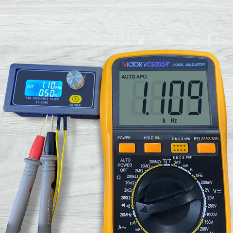 Beefy 1-Channel PWM Signal Generator XY-KPWM with digital multimeter displaying 1.109 kHz frequency measurement