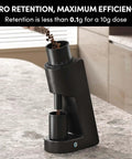 Top Shelf Single Dose Electric Coffee Grinder With 38mm Conical Burrs And Stepless Dial 30G Hopper pouring beans for espresso.
