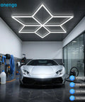 Hexagon LED Garage Light With Diamond Grid 710W 78100LM Mega Bright Ceiling Fixture installed over car in garage