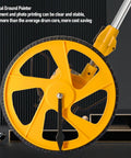 Glomora Measuring Wheel Double Folding Accurate 0-9999.9m Portable Distance Measuring Wheel for Work Projects yellow wheel close-up.