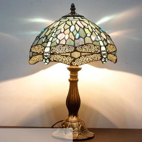 Lit Tiffany Style Sea Blue Stained Glass Table Lamp With Dragonfly Motif 12 Inch Wide Shade 18 Inch Tall Desk Reading Light Antique Green Bronze Base UL Listed S147 Series.