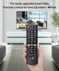 Hand holding Universal Smart TV Remote Replacement For All LG OLED 3D ThinQ TVs With Battery Easy Setup No Fuss Plug And Play Control.