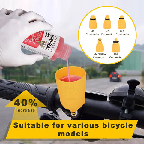 Dual Use Hydraulic Brake Bleed Kit For Road And MTB Bikes With M4 To M7 Adapters Mineral Oil Fluid And 2 X 60ml Bottles shown in use