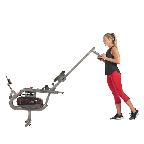 Person folding Phantom Hydro Water Rowing Machine With Realistic Water Resistance 60 Degree Tank 16 Hydro Blades Silver Finish SF RW5910
