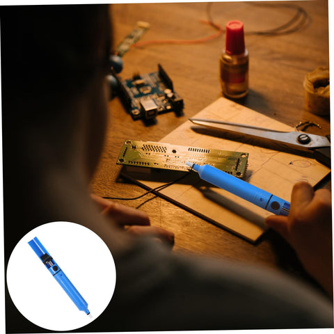 Person using Desoldering Gun Solder Sucker Pen Set 2 Pack Vacuum Solder Removal Tool For PCBs on circuit board at workbench