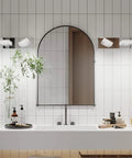 Lit Three Light Chrome Vanity Light Bar With Dimmable LED Heads over bathroom mirror, modern chrome finish.