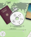 Must Have Travel Power Strip with three outlets and three USB ports including USB C, cruise approved, compact white, shown with passport.