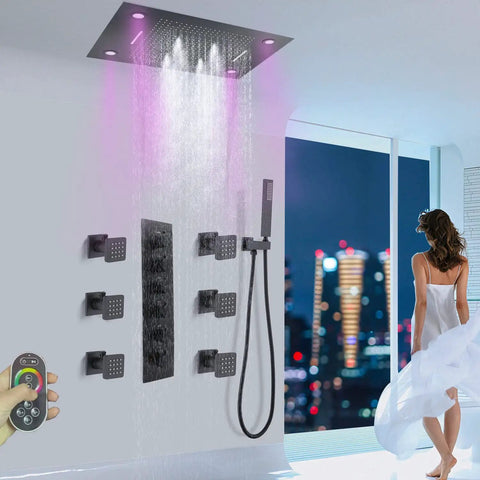 Sleek Matte Black Ceiling Rain Shower System With 24X32 Inch Led Spray Head, showcasing water flow and adjustable jets.