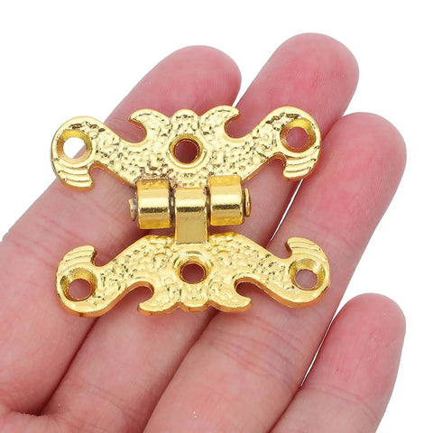 Retro Style Decorative Hinges Set 16 Zinc Alloy Cabinet Hardware with floral edge design displayed on hand