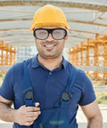 Heavy Duty Steampunk Welding Safety Glasses With Kick Ass Eye Protection Goggles worn by man in hard hat at construction site.