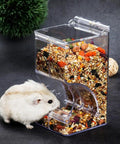 Top Rated Two Piece Automatic Hamster Feeder With Sturdy Wall Mount Brackets And Wide Mouth Design fits standard avian cages, filled with seeds.