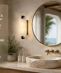 Tonabona 2 Pack 2 Light 15" Natural Alabaster Oval Marble Farmhouse Bathroom Black Wall Sconce in elegant bathroom setting.