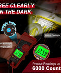 6000 Count Digital Clamp Meter With True RMS and backlit display showing 12.58 reading, highlighting built-in flashlight feature