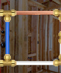 Six Pack 1/2 Inch Push Fit Tee Fittings With Disconnect Clip installed on copper, blue and white pipes in construction site