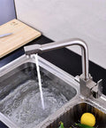 Brushed el Kitchen Faucet with 360° SwivelDual Handle Drinking Water Filter TapDeck Mounted Sink Mixer3-Way Design for Home & Kitchen Use - Ausious Clouds LWX pouring water into a stainless steel sink.