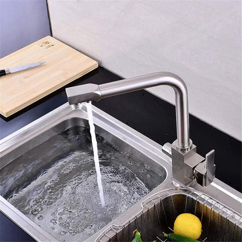 Brushed el Kitchen Faucet with 360° SwivelDual Handle Drinking Water Filter TapDeck Mounted Sink Mixer3-Way Design for Home & Kitchen Use - Ausious Clouds LWX pouring water into a stainless steel sink.
