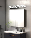 Lit Three Light Chrome Vanity Light Bar With Dimmable LED Heads, Adjustable 180 Degree Up Down And 360 Degree Swivel, installed over mirror