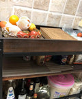 Three Tier Solid Pine and Steel Kitchen Cart with Built In Bottle Rack Industrial Vintage Rolling Utility Shelf Heavy Duty No Nonsense Roomside Storage Organizer with fruits and vegetable tray.