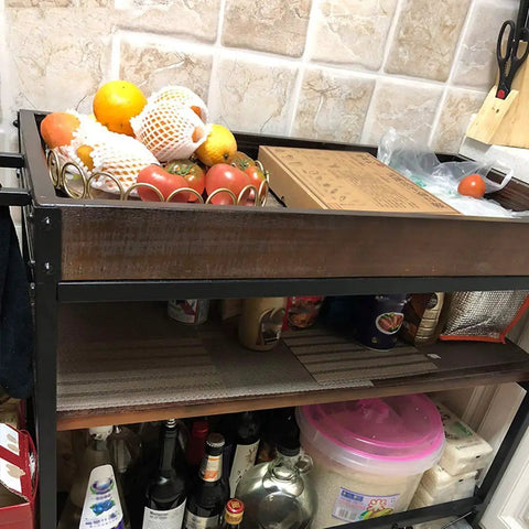 Three Tier Solid Pine and Steel Kitchen Cart with Built In Bottle Rack Industrial Vintage Rolling Utility Shelf Heavy Duty No Nonsense Roomside Storage Organizer with fruits and vegetable tray.