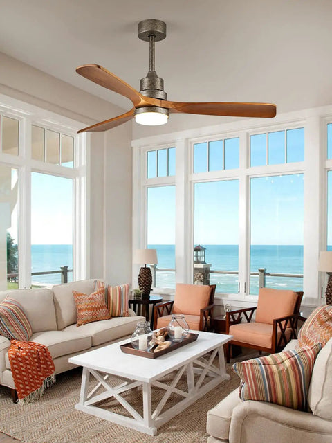 52 Inch Ceiling Fan With Light And Remote Control, 3 Blade Outdoor Wood Farmhouse Style Fan For Patio And Living Room, Reversible Quiet DC Motor, Vintage Nickel Finish, Classic Old School Vibe in living room with ocean view