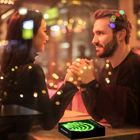 Couple holding hands under 50ft RGB LED Strip Lights with Music Sync and Bluetooth App Control, ambient home decor