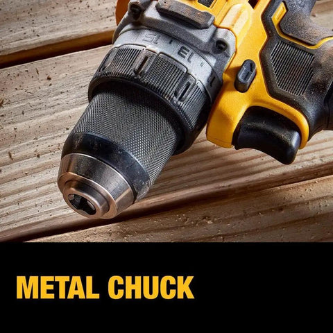 Close-up of metal chuck on 20V Max XR Brushless Cordless Drill, highlighting half-inch ratcheting mechanism on wooden surface.