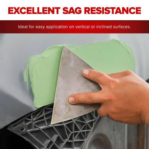 Application of Ready Mix Epoxy Fairing Compound One Gallon Heavy Duty Formula on a vertical surface with a spatula.