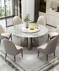Top Shelf Faux Marble Round Dining Table With Effortless Spin Lazy Susan Turntable Solid Black Metal Pedestal Base For Modern Kitchen Gatherings Accommodates Four Guests Without Extra Chairs, with six chairs and a flower vase.