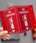 3D Fire Extinguisher Wall Sign With Projecting Design For Easy Emergency Visibility And Quick Access Indoor Durable OSHA Compliant Fire Safety Sign Measures Six By Eight By Four Inches For High Visibility And No Nonsense Reliability, held in hand.
