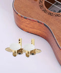 Vintage Carving Ukulele Tuning Pegs And Classical Guitar Machine Heads Replacement Parts, brass-coated gold tuners with white knobs